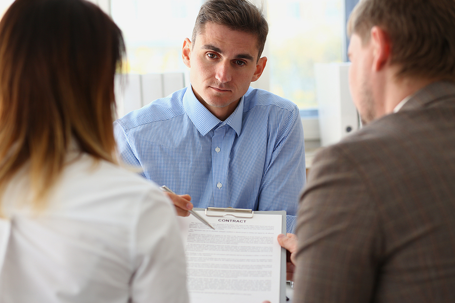 Portrait Of Man Worker In Suit Give Contract Paper To Clients,