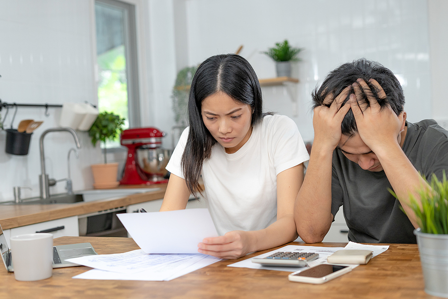 couple bothered with credit card debt